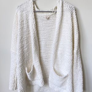 white cardigan/ sweater